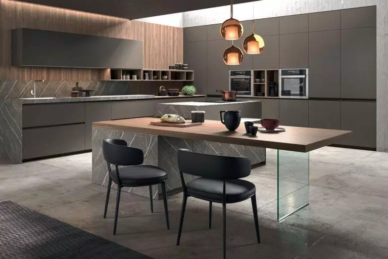 Cucina moderna con penisola e tavolo integrato
